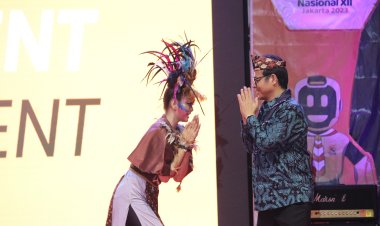 WAMEN KOMINFO TERPESONA KIBASAN EKOR KUAU”